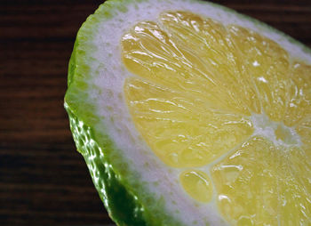 Close-up of lemon slice on table