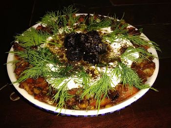 Close-up of salad in black background