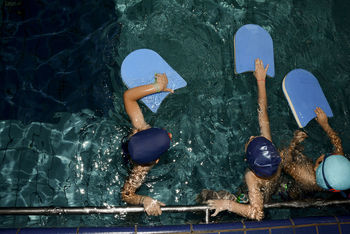 High angle view of children in swimming pool