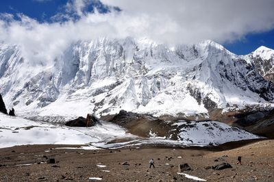 Scenic view of mountains against sky during winter