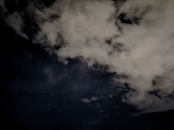 Low angle view of clouds in sky at night