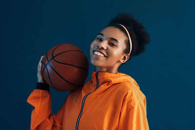 Young man playing basketball