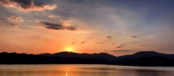 Scenic view of mountains at sunset