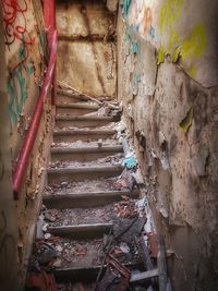 Low angle view of steps in abandoned building