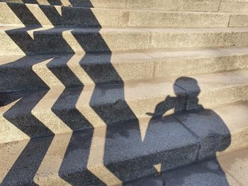 Shadow of people on staircase