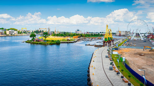 High angle view of river against sky in city