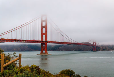 Suspension bridge over river