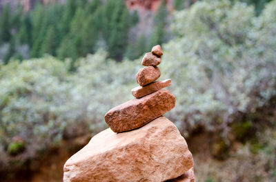 Close-up of stone stack on rock