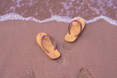 High angle view of heart shape on sand