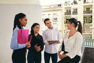 Group of people against the wall