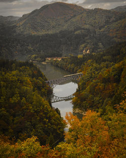 High angle view of lake amidst trees during autumn