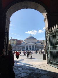 Group of people in front of historical building