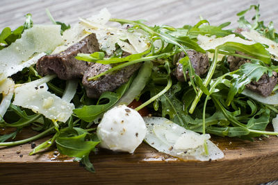 Close-up of chopped vegetables on table