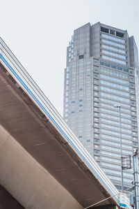 Low angle view of modern building against clear sky