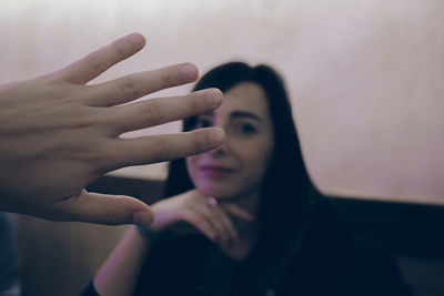 Close-up of woman with hands