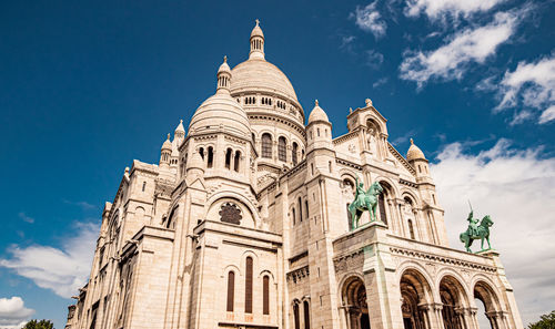 Low angle view of cathedral against blue sky