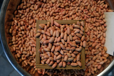 Directly above shot of peanuts for sale in market