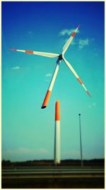 Wind turbines on field