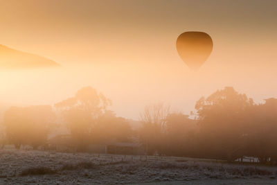 View of hot air balloon at sunset