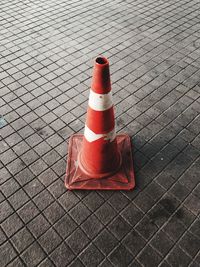 High angle view of traffic cone on footpath