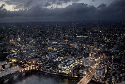 High angle view of city against cloudy sky