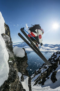 Man ski jumping in jan mayen