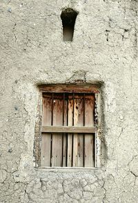 Brick wall with closed door