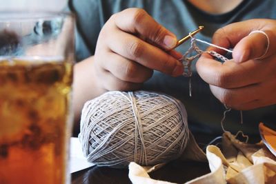 Close-up of hands knitting