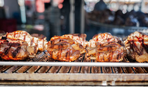 Close-up of meat on barbecue grill