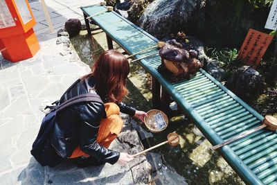 High angle view of people on barbecue grill