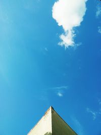 Low angle view of building against blue sky