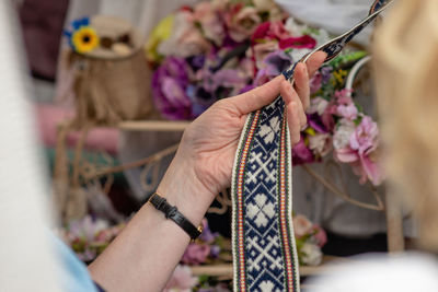 Close-up of woman hand holding lace