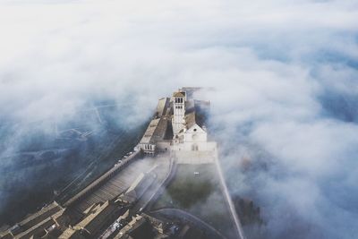 High angle view of historic building against cloudy sky