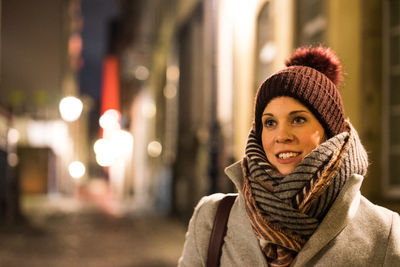 Portrait of smiling woman in snow