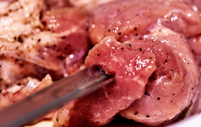 Close-up of meat on barbecue grill