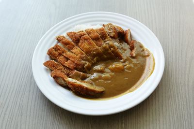 High angle view of chicken katsu served in plate on table