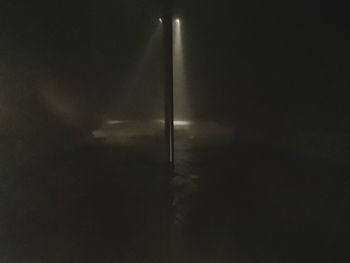 Low angle view of illuminated street light at night