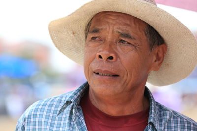 Portrait of man wearing hat