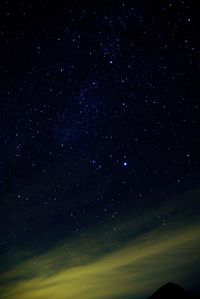 Low angle view of stars against sky at night