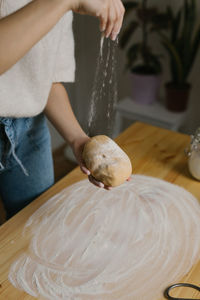 Young woman making christmas cookies