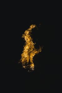 Firework display over black background
