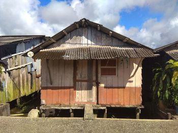 Exterior of abandoned building against sky