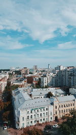 High angle view of buildings in city against sky