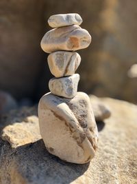 Close-up of stone stack on rock