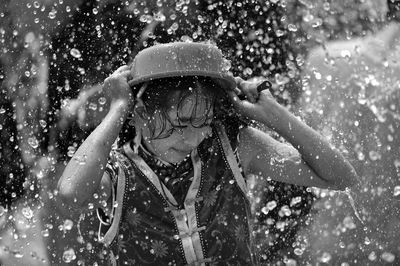 Close-up of boy enjoying at water park