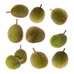 Close-up of fruits against white background