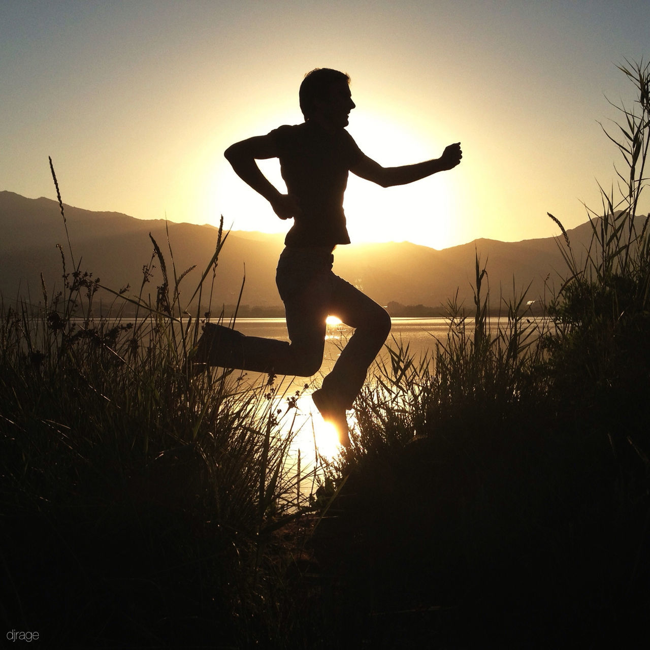 sunset, silhouette, sun, leisure activity, lifestyles, orange color, sky, tranquility, tranquil scene, scenics, beauty in nature, nature, full length, clear sky, standing, idyllic, beach, sunlight