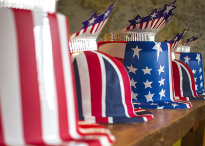 Close-up of british flag hats in row