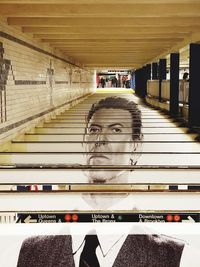 Portrait of man on railroad station platform