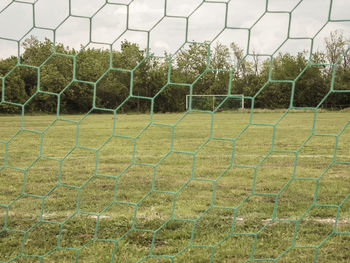 Close-up of soccer field against sky